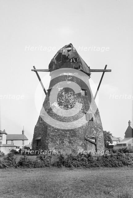 Exterior view of the derelict tower mill on Mill Green, Warboys, Cambridgeshire, 1936. Creator: HES Simmons.