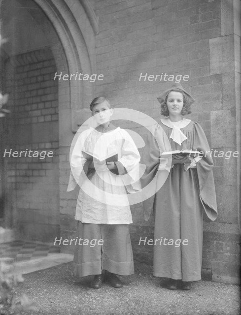 Girl and boy chorister, (Isle of Wight?), c1935. Creator: Kirk & Sons of Cowes.