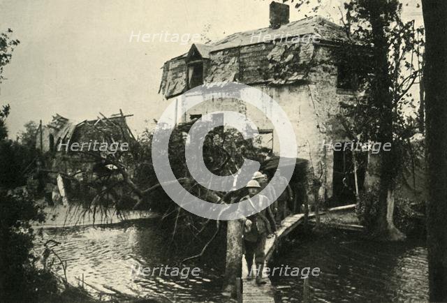 'In the Ypres Salient: British troops leaving their billets...', First World War, 1917, (c1920). Creator: Unknown.