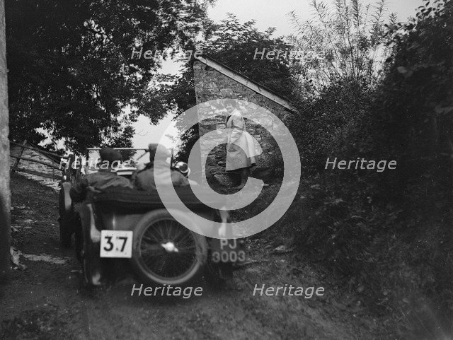 MG F Magna competing in the JCC Lynton Trial, 1932. Artist: Bill Brunell.