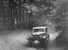 Riley competing in the B&HMC Brighton-Beer Trial, Fingle Bridge Hill, Devon, 1934. Artist: Bill Brunell.