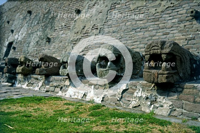 Tenayuca Pyramid, Aztec construction, the below part of the wall has snake heads surrounding the …