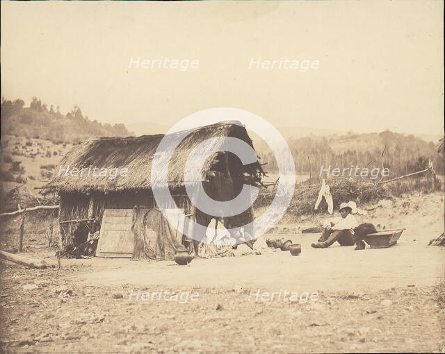Family Seated by Thatched Hut, South America, 1850s. Creator: Unknown.