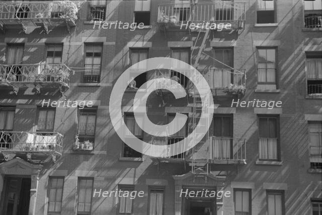 House fronts, 61st Street between 1st and 3rd Avenues, New York, 1938. Creator: Walker Evans.