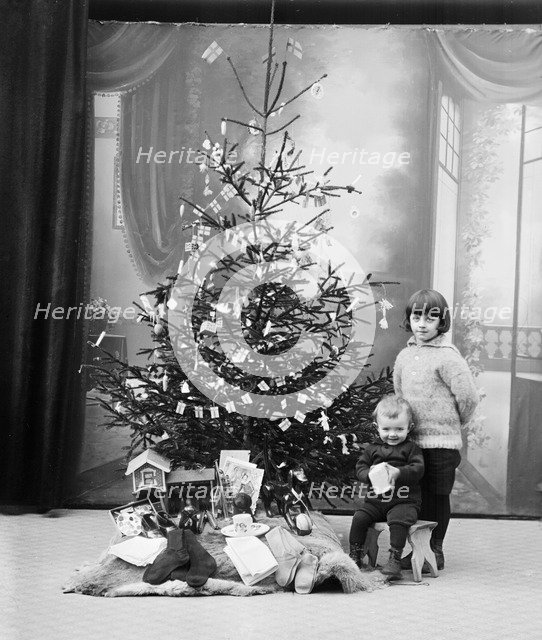 The photographer's children and their Christmas presents, Sweden. Artist: Unknown