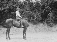 McCulloch, Mrs., daughter of, on horseback, 1929 June 13. Creator: Arnold Genthe.