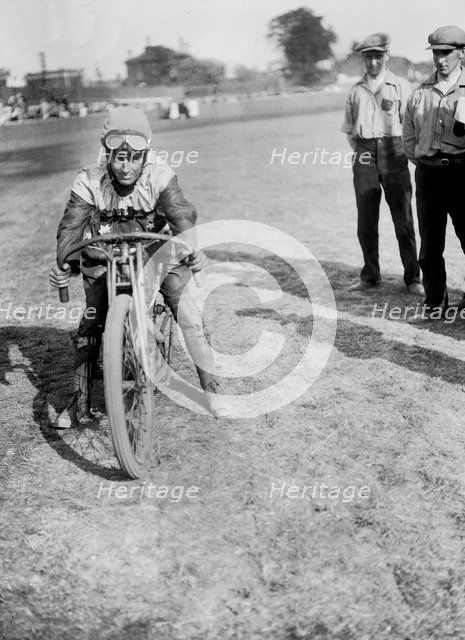American speedway rider Art Pecha on his Harley-Davidson, Lea Bridge Stadium, Leyton, London, 1928.  Artist: Bill Brunell.