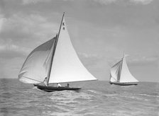 The 7 Metre 'Anitra' (foreground) and 'Nelta', on downwind leg, 1911. Creator: Kirk & Sons of Cowes.