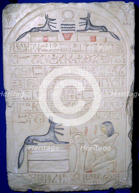 Egyptian elief stele of a man adoring Anubis. Artist: Unknown