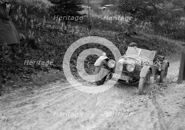 Riley Brooklands 2-seater sports of JE Lancaster taking part in the Inter-Varsity Trial, 1930. Artist: Bill Brunell.