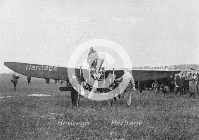 Louis Blériot about to make the first successful flight across the English Channel, 1909. Artist: Unknown
