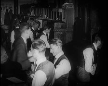 Journalists at Work in a Busy Newspaper Office, 1921. Creator: British Pathe Ltd.