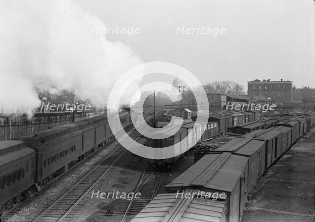 U.S. Capitol - Dome from Railroad Yards in Southeast Section, 1917. Creator: Harris & Ewing.