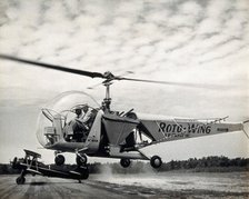 Sir Gordan Covell in a helicopter, Beltsville, Maryland, 1948. Creator: Unknown.