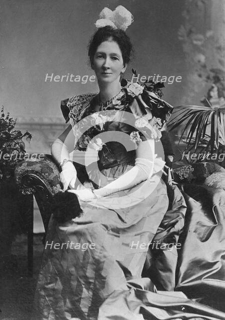 Portrait of unknown lady in a party dress, c1900s. Creator: Robert Augustus Henry L'Estrange.