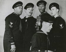 Group photograph of the U.S. Coast Guard Quartet members while singing, New York, N.Y., 1939 - 1945. Creator: Naval Photographic Center.