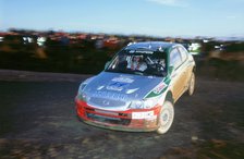 2002 Hyundai Accent WRC on 2002 Network Q rally, Kankkunen. Artist: Unknown.