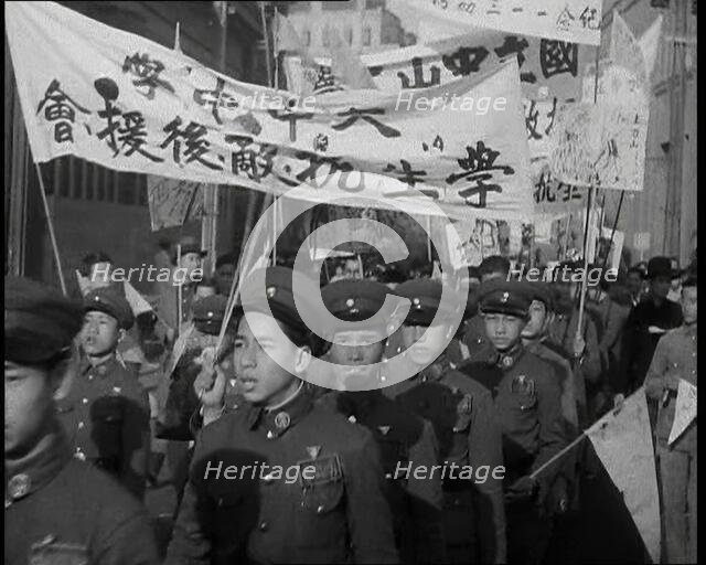 A Close up of Male Chinese Soldiers at an Anti-War Protest Many of Whom Are Carrying..., 1938. Creator: British Pathe Ltd.