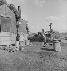 Living conditions of migrant agricultural workers, Tulare County, California, 1938. Creator: Dorothea Lange.