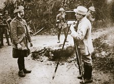 Cameraman filming a wounded soldier, Somme campaign, France, World War I, 1916. Artist: Unknown