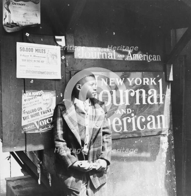 Harlem newsboy, New York, 1943. Creator: Gordon Parks.