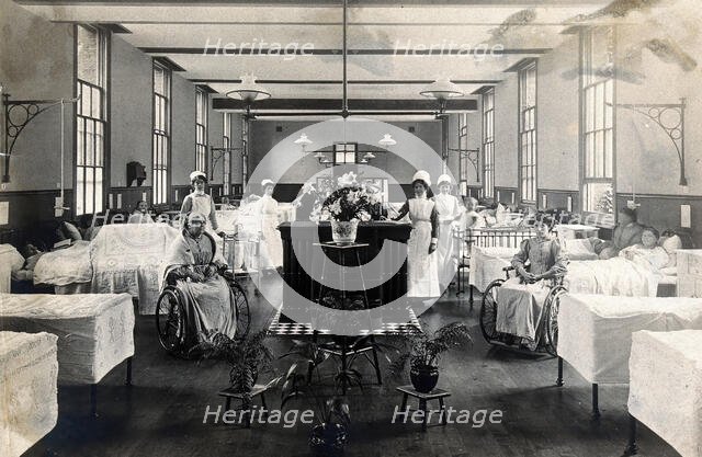 St Marylebone Infirmary, London: ward with nurses and patients, 1910. Creator: Unknown.