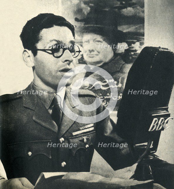 'He reads the news in Moroccan Arabic. A member of the Fighting French Army', 1942. Creator: Unknown.