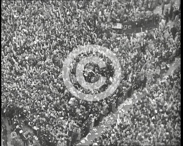 Crowds Watching the Coronation Procession of George VI, His Majesty the King, 1937. Creator: British Pathe Ltd.