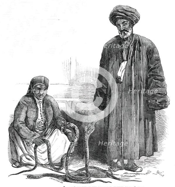 The Serpent-Charmers at the Gardens of the Zoological Society, Regent's-Park, 1850. Creator: Pearson.
