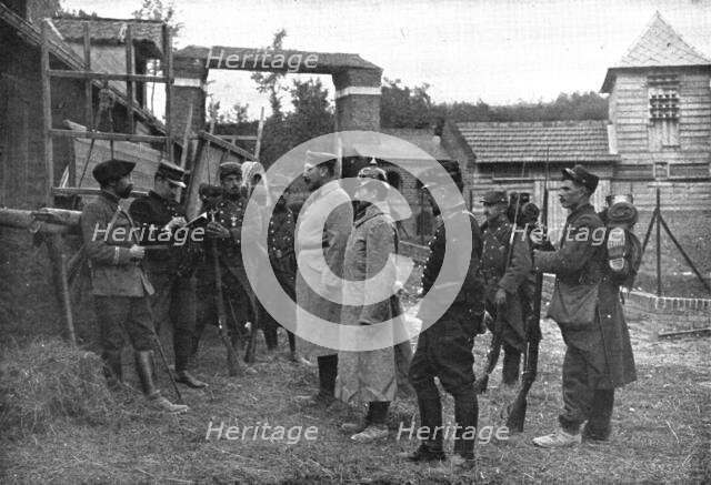 ''Premiers Prisonniers Allemands; Ensuite, on les interroge', 1914. Creator: Unknown.
