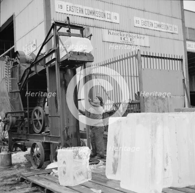 Ice used to store fish in ships, New York, 1943. Creator: Gordon Parks.