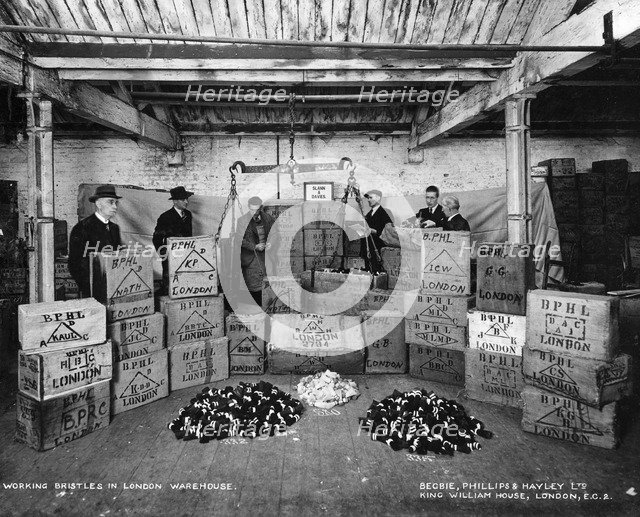 Working with bristles in a warehouse, London, 1938. Artist: Unknown
