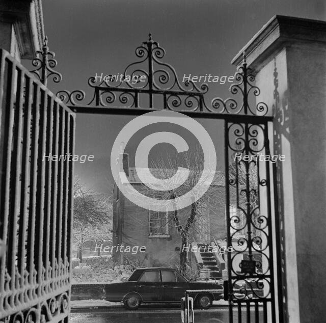 Detail of the wrought iron gate and overthrow at the Old Hall, Highgate, London, 1967. Creator: John Gay.