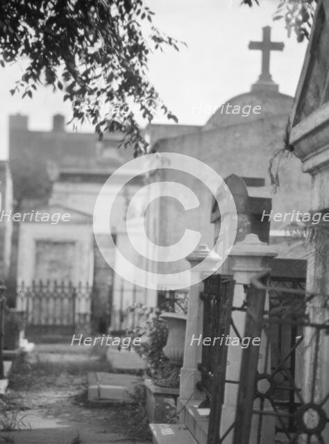 Tombs in St. Louis Cemetery, New Orleans, between 1920 and 1926. Creator: Arnold Genthe.