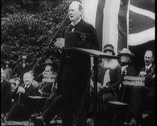 Winston Churchill Making a Speech from a Platform Infront of a Small Crowd, 1924. Creator: British Pathe Ltd.