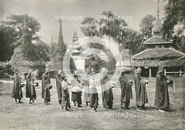 'Burmese Phoongyies Collecting Alms', 1900. Creator: Unknown.