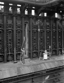 Spraying refractory linings at Manvers coking works, near Rotherham, South Yorkshire, 1963. Artist: Michael Walters