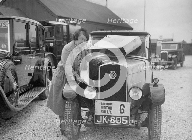 Mrs JW McClintock with her Triumph saloon at the B&HMC Brighton Motor Rally, 1930. Artist: Bill Brunell.