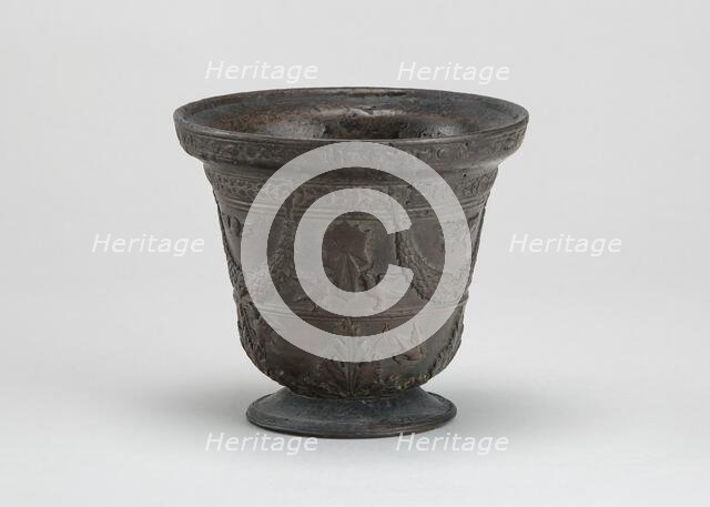 Mortar with Birds, Cherubim, Armorial Shield, and Festoons, early 16th century. Creator: Unknown.