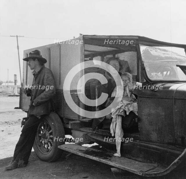 Family, one month from South Dakota, now on the road..., Tulelake, Siskiyou County, California, 1939 Creator: Dorothea Lange.