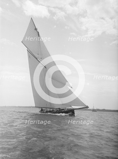 The gaff rigged cutter 'Bloodhound' sailing close-hauled, 1911. Creator: Kirk & Sons of Cowes.