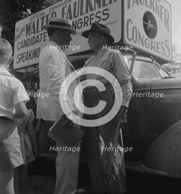 Candidate for congress (General Walter Faulkner) and a Tennessee farmer, Crossville, Tennessee, 1938 Creator: Dorothea Lange.