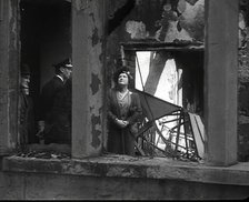 King George VI and Queen Elizabeth Inspecting Bomb Damage, 1942. Creator: British Pathe Ltd.