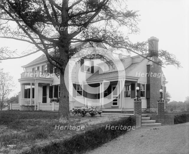 Calloway residence, back & side with tree & flower bed, Mamaroneck, N.Y., between 1900 and 1915. Creator: William H. Jackson.