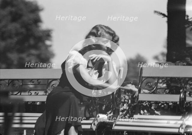 Roelof, Wilma, Miss, seated outdoors, 1932 July. Creator: Arnold Genthe.