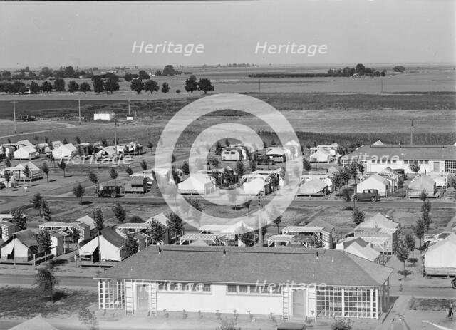 Farm Security Administration camp for migrant agricultural workers at Shafter, California, 1938. Creator: Dorothea Lange.
