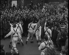 A Crowd of People Watching Morris Dancers Perform, 1931. Creator: British Pathe Ltd.