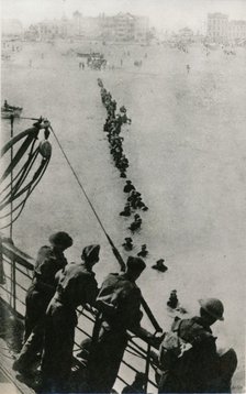 Allied troops wait for a ship during the Dunkirk evacuation, 1940. Artist: Unknown