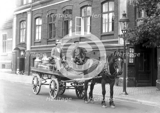 Transporting milk by horse and cart, Landskrona, Sweden, 1915. Artist: Unknown