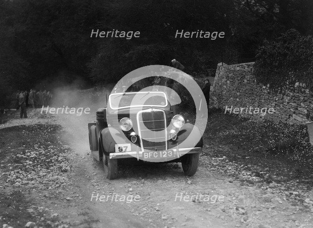 Ford V8 drophead competing in a motoring trial, Nailsworth Ladder, Gloucestershire, 1930s. Artist: Bill Brunell.
